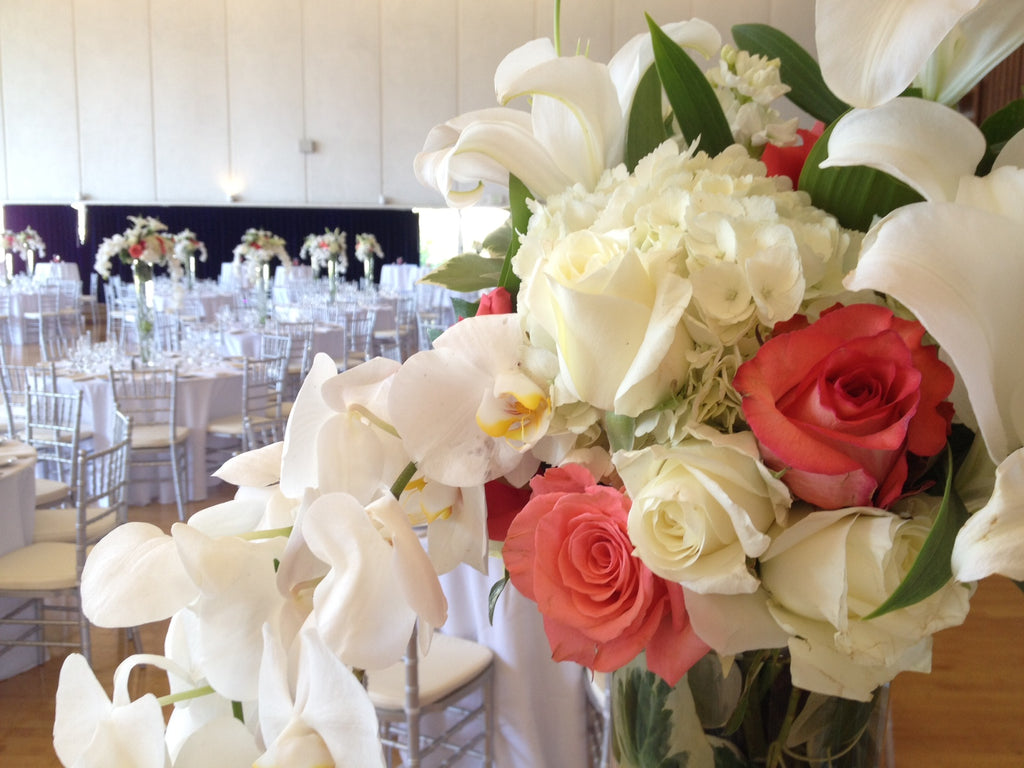 Cal wedding flowers, tall trumpet vases by Gorgeous and Green